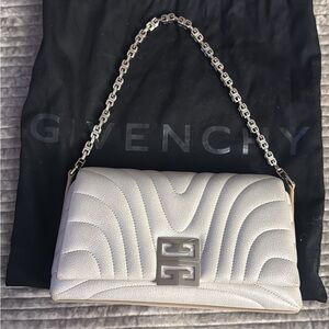 Givenchy bag in ivory, can be worn as a shoulder or crossbody.